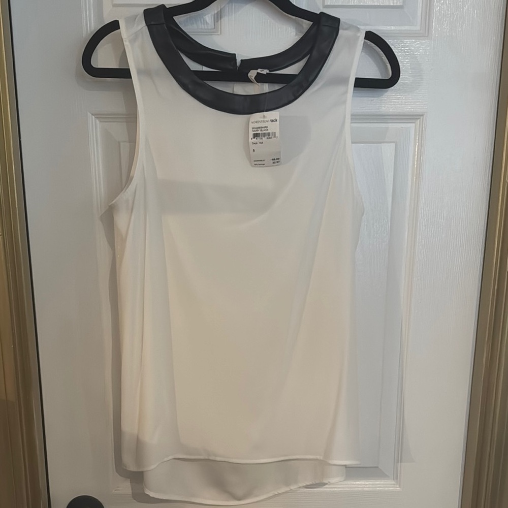 Bellatrix White Sleeveless Blouse with leather trim